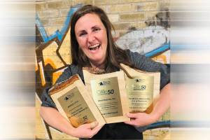 Tin Whistle Brewing president Alexis Esseltine holds her Canada’s Clean50 awards in October 2025. (Submitted)